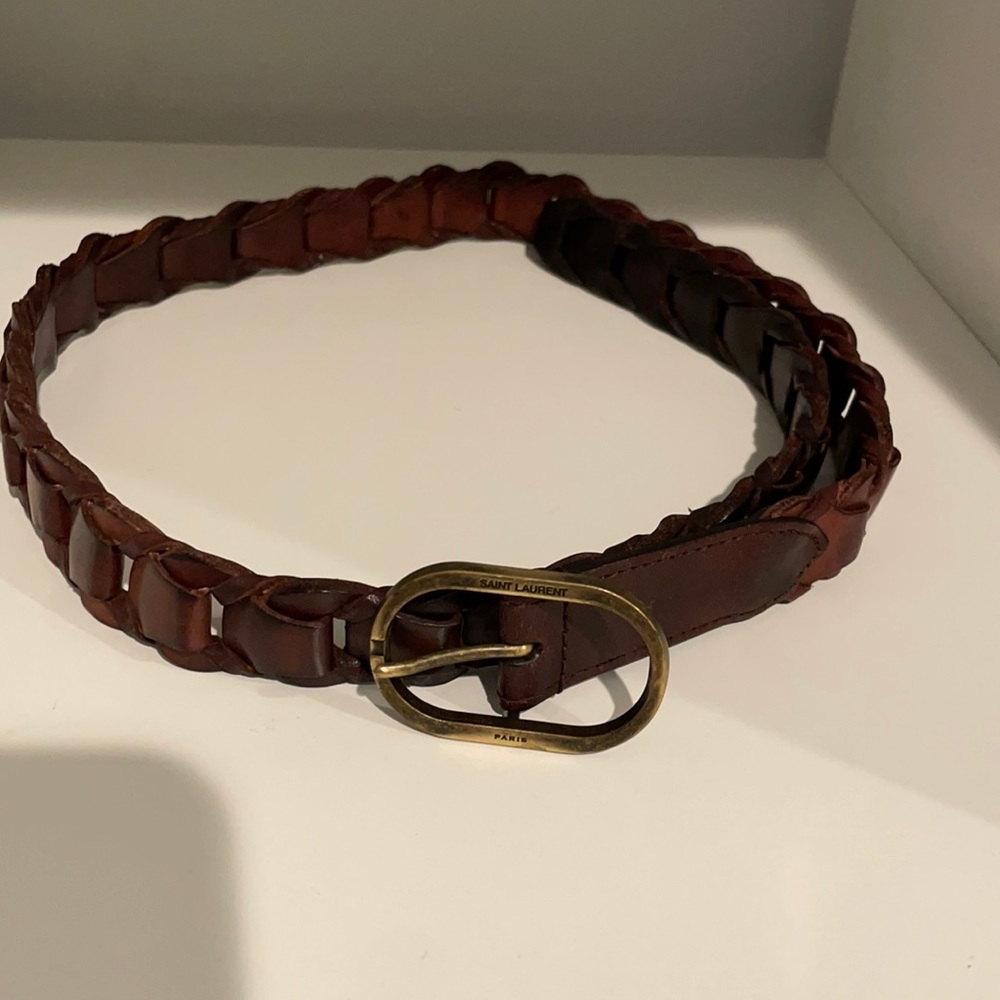 St Laurent belt, weaved details and a rounded vintage gold buckle.